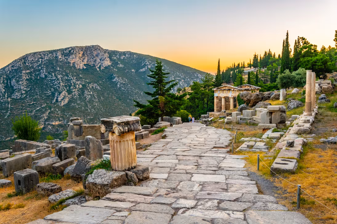 Athenian Treasury at Delphi — reconstructed ancient building on the mountainside