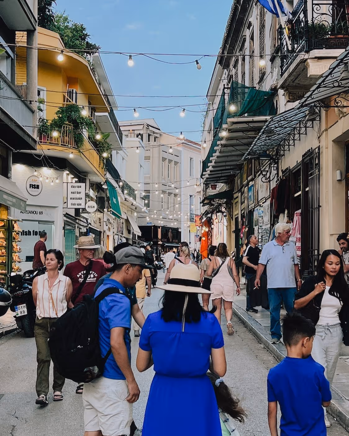 Monastiraki pedestrian street in Athens — vibrant shops and cafes with the Acropolis in the background